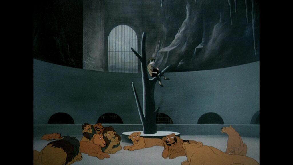 The organ grinder in a dead tree in the lion enclosure