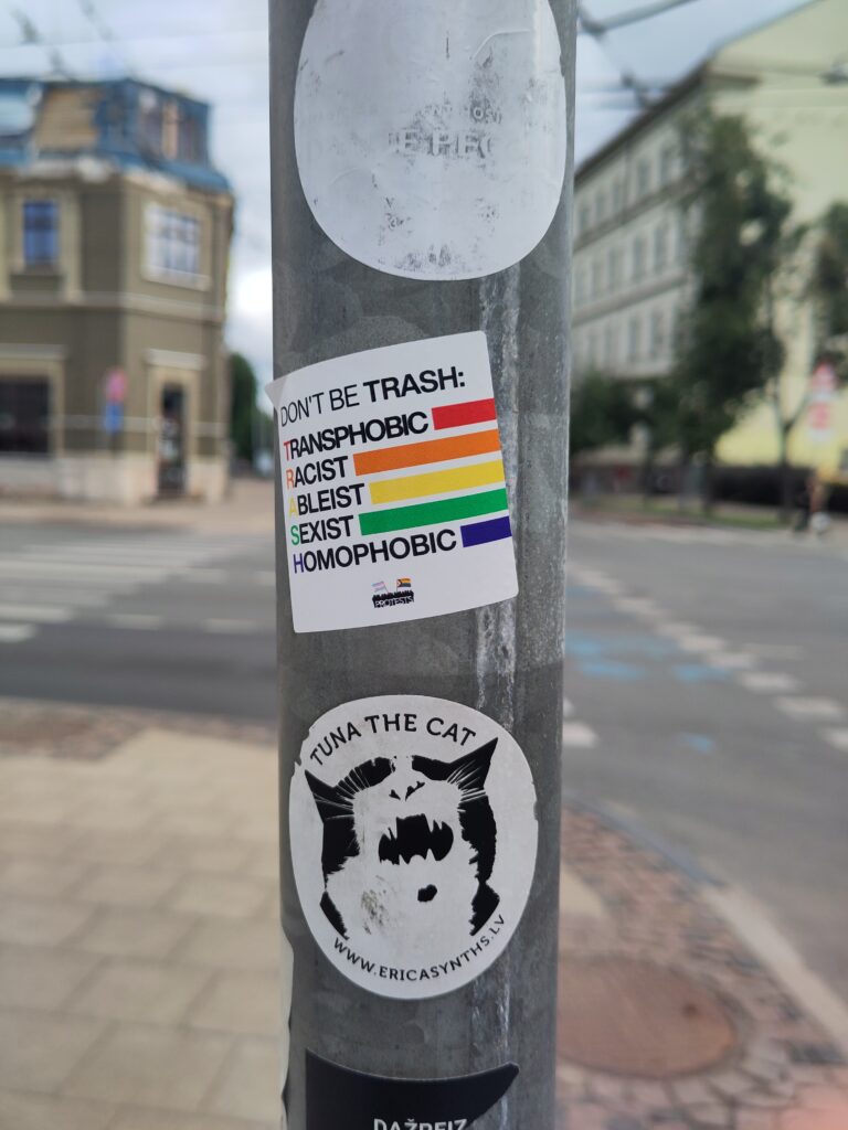 A sticker says:
Don't be trash
Transphobic
Racist 
Abelist
Sexist
Homophobic